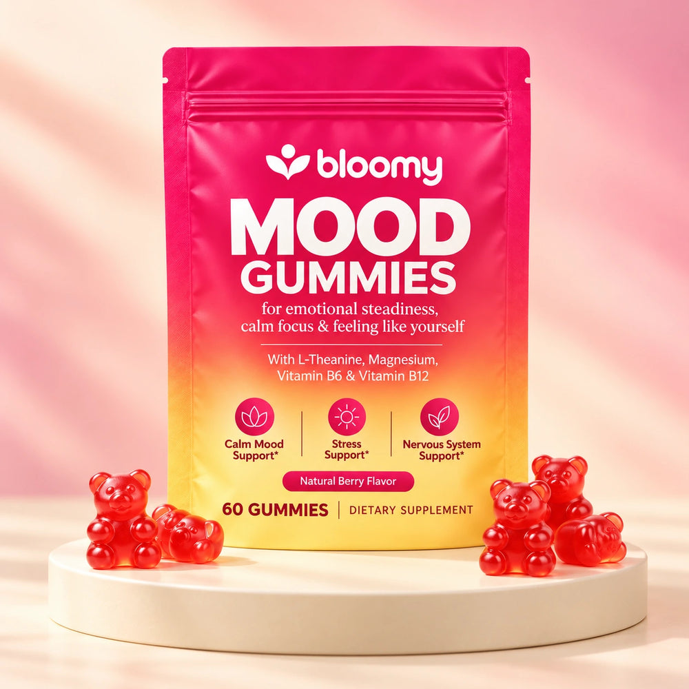 Bloomy Mood Gummies pouch on a cream pedestal with red bear-shaped gummies